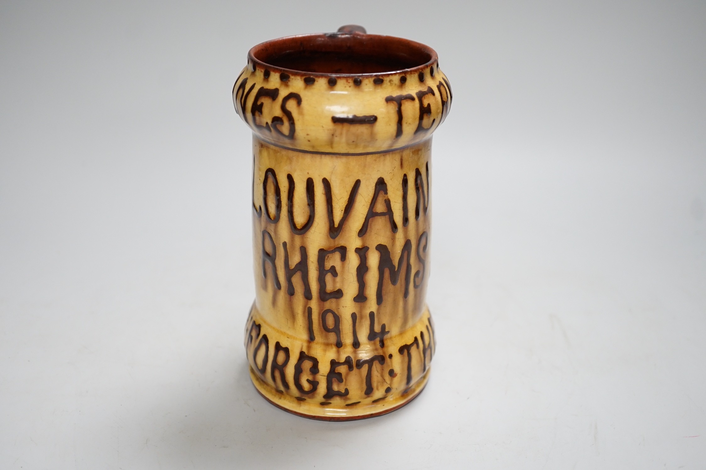 A Dicker slipware tankard ‘Malines-Termonde Louvain Rheims 1914 Never Forget the Huns’, 17cm